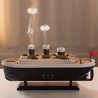 Umidificator de aer Ocean Mist Ship, vapori reci, LED, telecomandă și 12 uleiuri esențiale